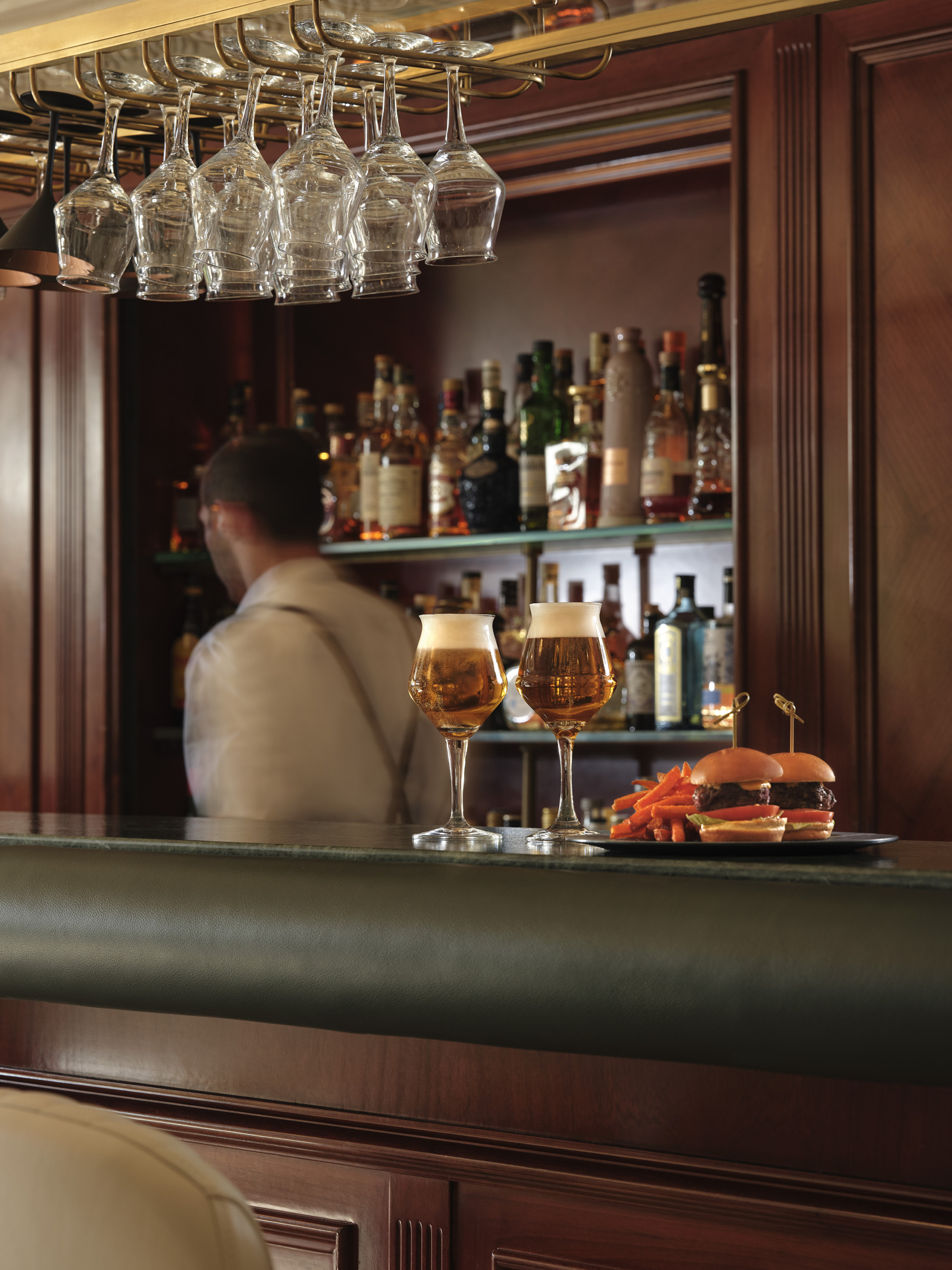 electra-palace-athens-ducktail-bar-bartender-serving