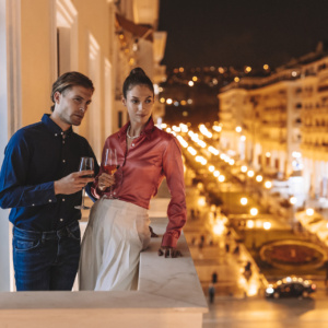 Couple on a balcony spending the perfect Valentine's day in Thessaloniki at Electra Hotels