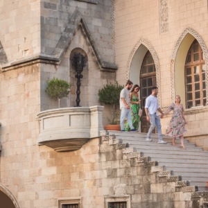 Two couples enjoying the landmarks of Rhodes in Spring.