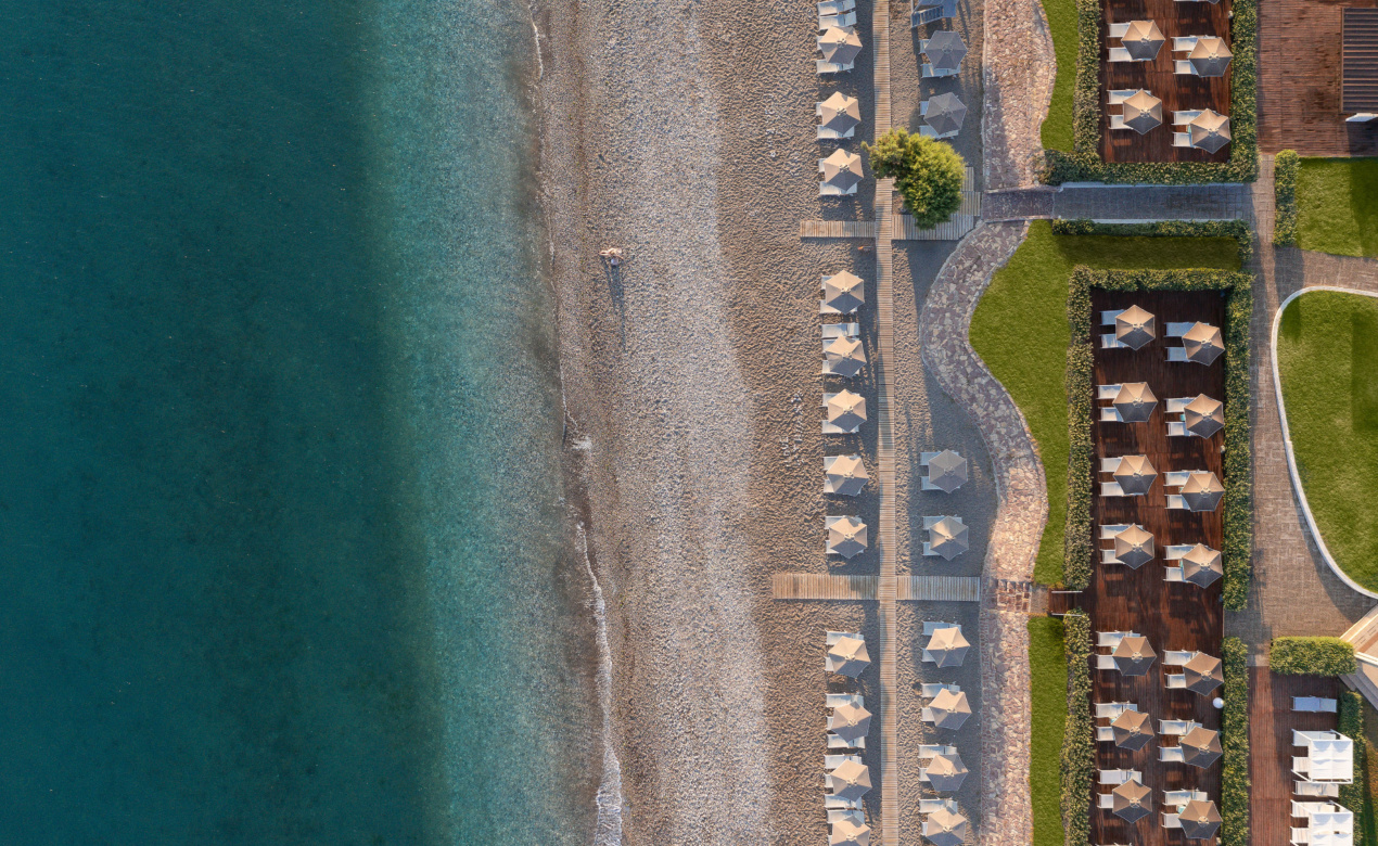Ialyssos beach in front of Electra Palace Rhodes from above, the perfect location to drop the pin and enjoy a wonderful getaway in Rhodes for families.
