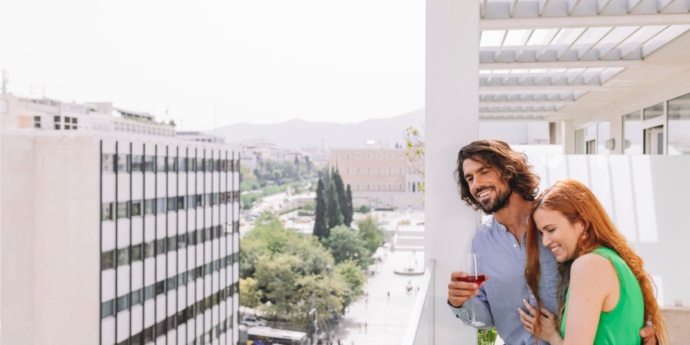Electra_Hotel_Athens_Lifestyle_Couple_Balcony_-scaled-2
