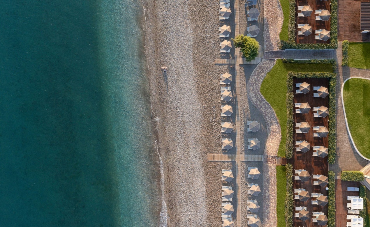 Aerial view of Ialyssos, one of the best Rhodes beaches, and the daily horizon of Electra Palace Rhodes Hotel. 