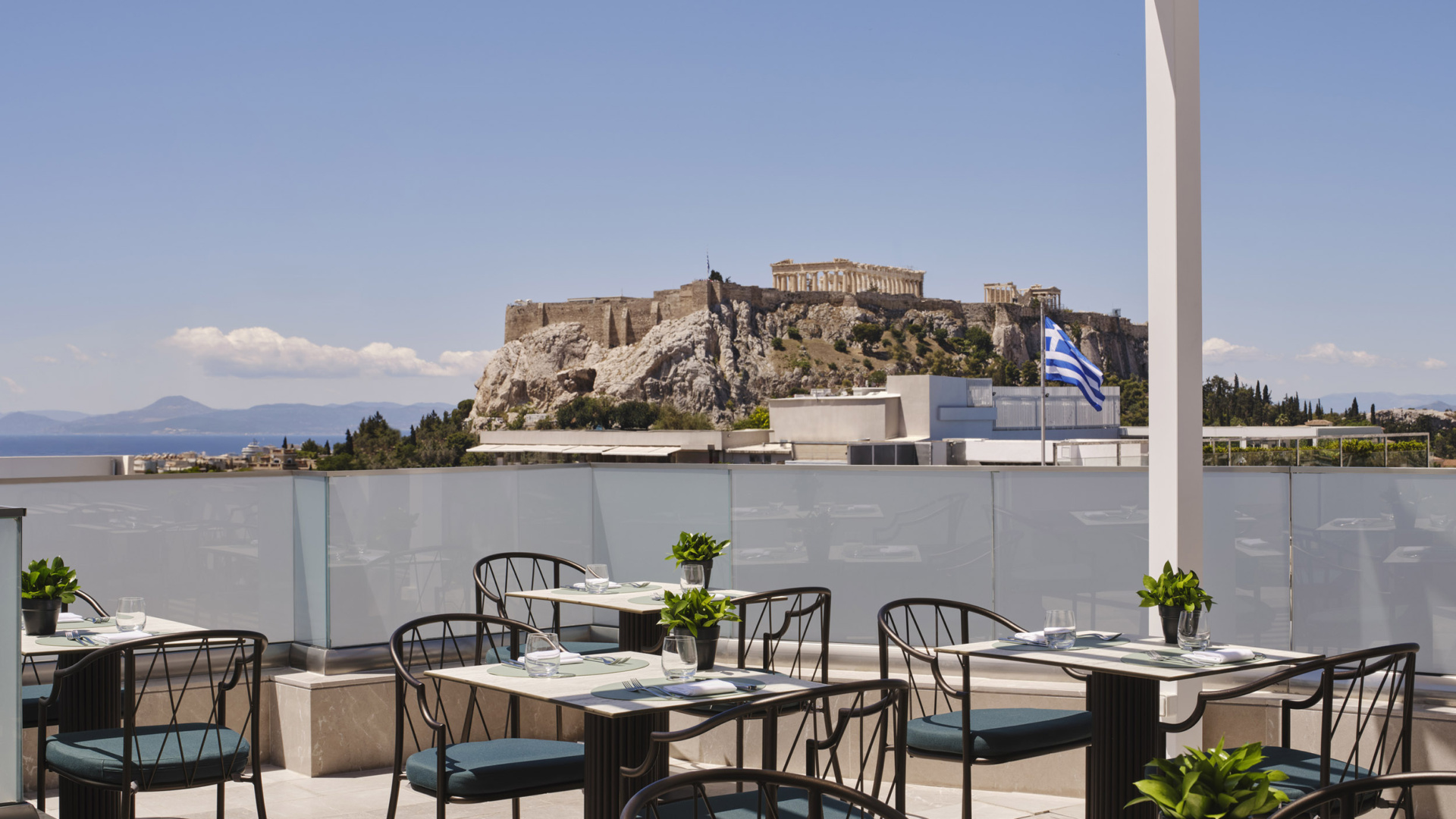 The Acropolis view rooftop of Electra Rhythm Athens’ restaurant – a stylish Athens city hotel designed for modern travellers seeking comfort, culture, and urban energy.
