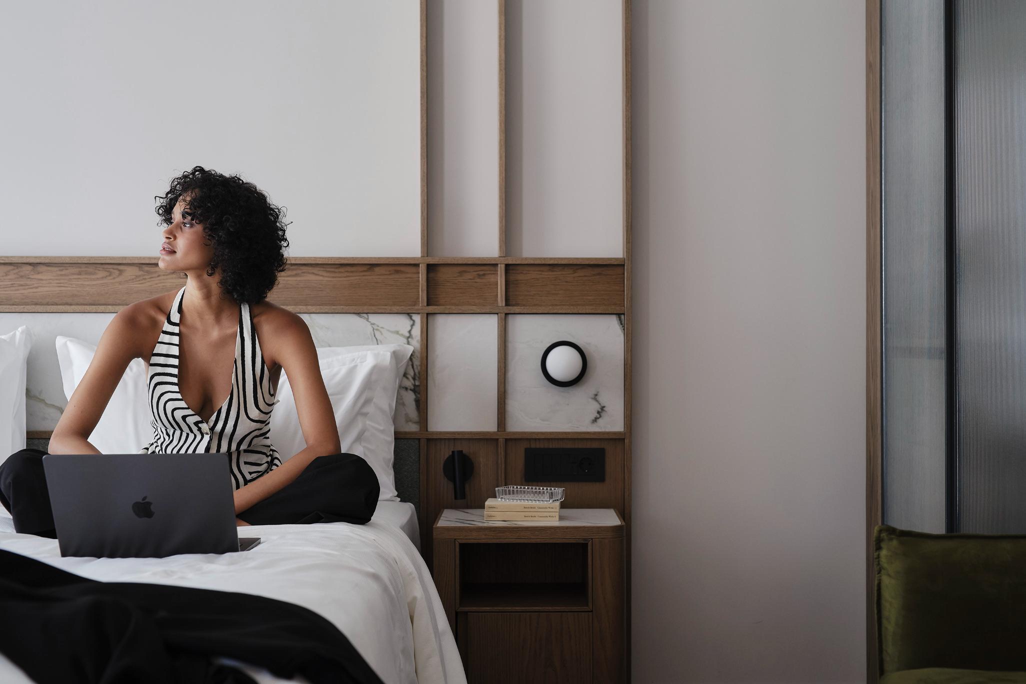 electra-rhythm-athens-room-laptop-on-bed