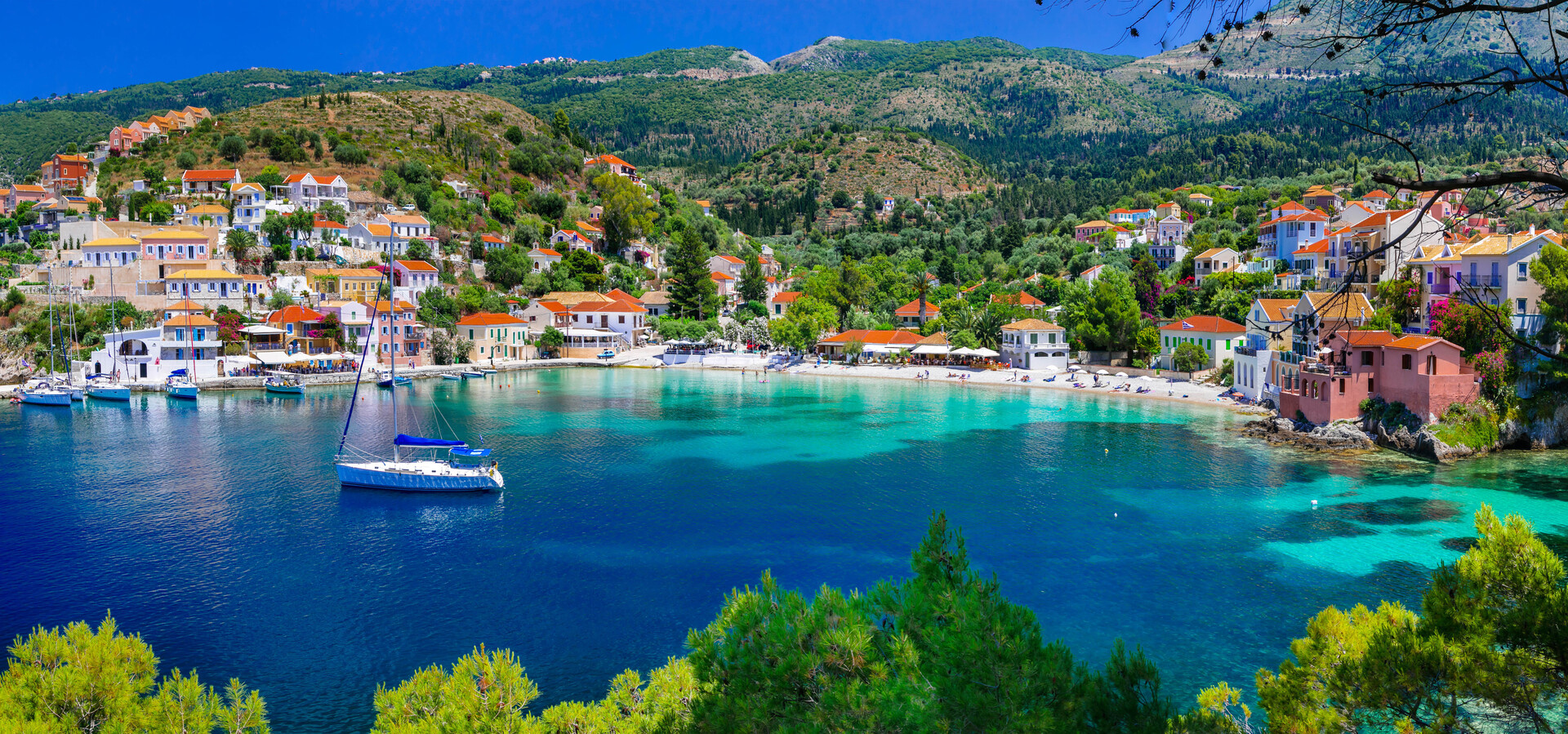 The colorful Assos village is among the best places to visit in Kefalonia Island.