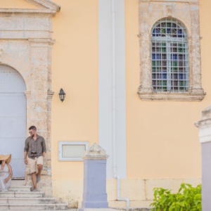Couple pictured at the entrance of a mansion during their trip to Kefalonia in autumn.